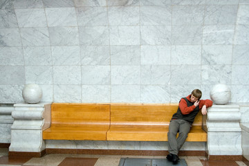 man speaking on the telephone