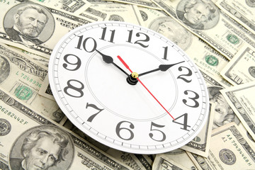 wall clock and dollars
