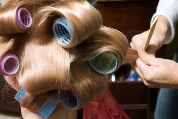 girl in hair rollers
