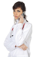 attractive lady doctor speaking on the telephone