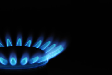 burning gas oven in kitchen