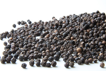 whole black pepper close-up