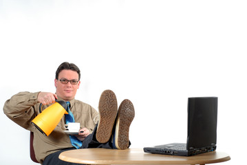 young businessman having coffee break