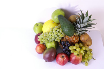 assorted fruit against a white background