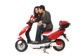 Fototapeta na wymiar couple girls talking on scooter