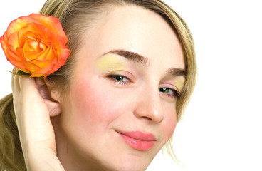 beautiful blonde girl with rose in her hair