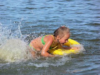 a girl playing in water
