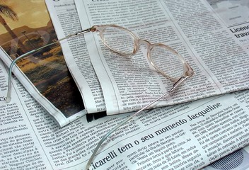 newspaper and the glasses