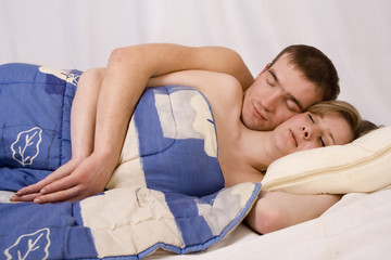 Obraz na płótnie Canvas sleeping young couple