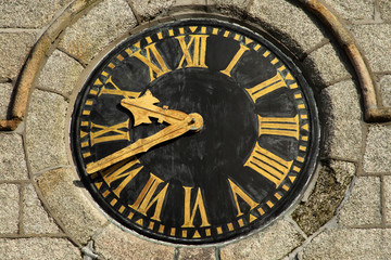Fototapeta na wymiar close up of an old clock face.