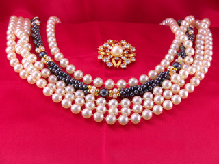 pearls and brooch