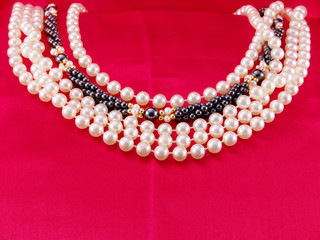 white and black pearls