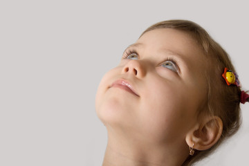 little girl look up