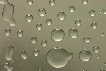 drops of water on a metal surface