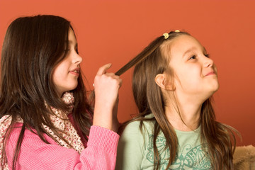 girls touching hair