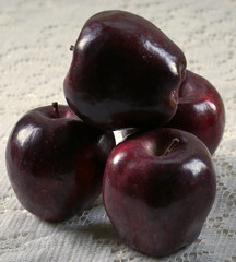 four red delicious apples