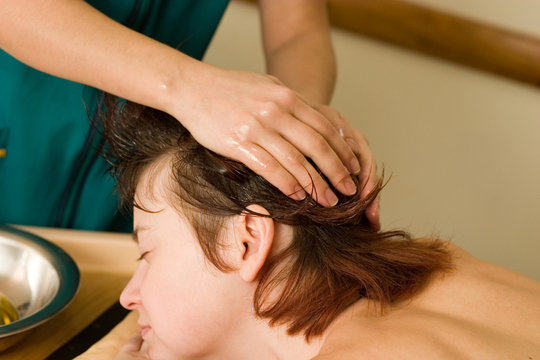 ayurvedic oil massage of the scalp