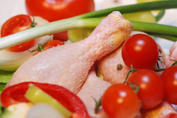 legs with vegetables close up