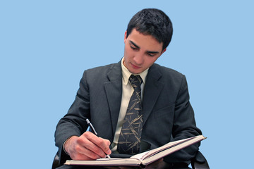 young businessman writing