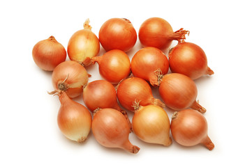 lots of onions isolated on white background