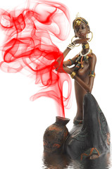 figurine of the african girl on a white background