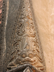 detail of paya architecture with a dragon, bagan, myanmar