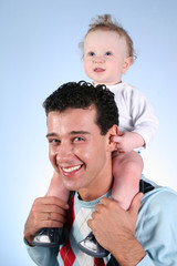 baby on fathers shoulders