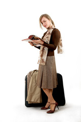  woman with huge bag reading newspapers