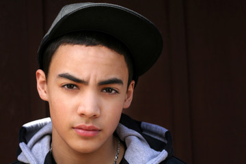 teenage boy wearing hat