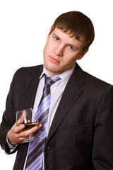 tired business man with a glass of cognac