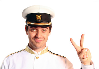 man in military sailer field uniform with hat saluting