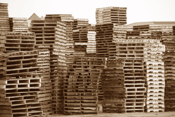stacked crates in sepia