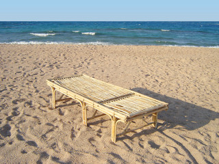 bamboo chaise longue on beach