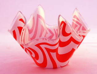 isolated red and white fabric glass bowl