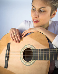 Fototapeta premium woman and guitar