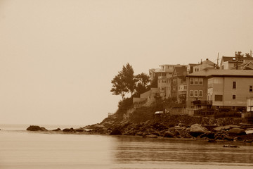 cottage on the coast in sepia