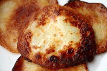 fritters on white plate