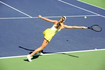 Foto op Plexiglas woman playing tennis © Galina Barskaya