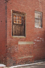 old windows on a brick building