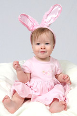 baby girl with rabbit ears