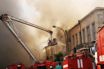 firefighters at the fire in the citycenter