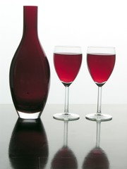 red wine and red vase