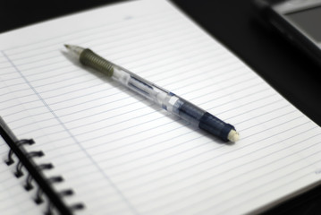 pen on notepad
