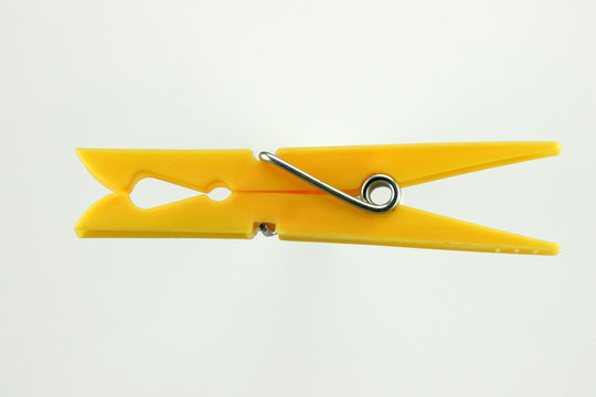 yellow clothes-peg