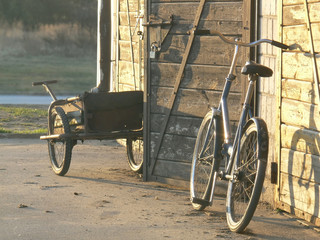 Fototapeta na wymiar poor trolley and bicycle