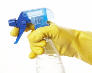 hand in yellow rubber glove with a spray 2