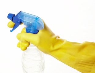 hand in yellow rubber glove with a spray 4
