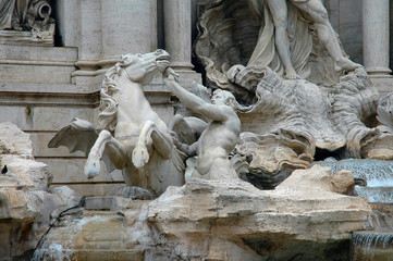 scuulpture of man & horse in trevi fountain