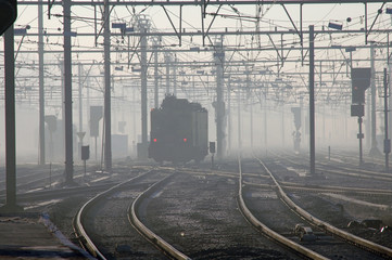 Plakat train in early morning fog in brugges, belgium