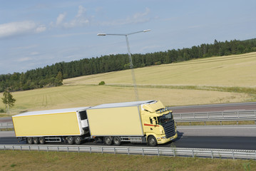 yellow truck against yellow fields